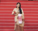Aimee Baruah walks in the red carpet of Cannes wearing an Assamese Mekhela Sador designed by Momita Sharma